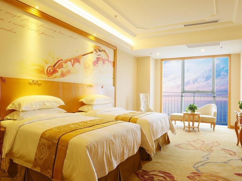 Vienna International Hotel Yantai Changjiang Road Xingyi Square Branch מראה חיצוני תמונה